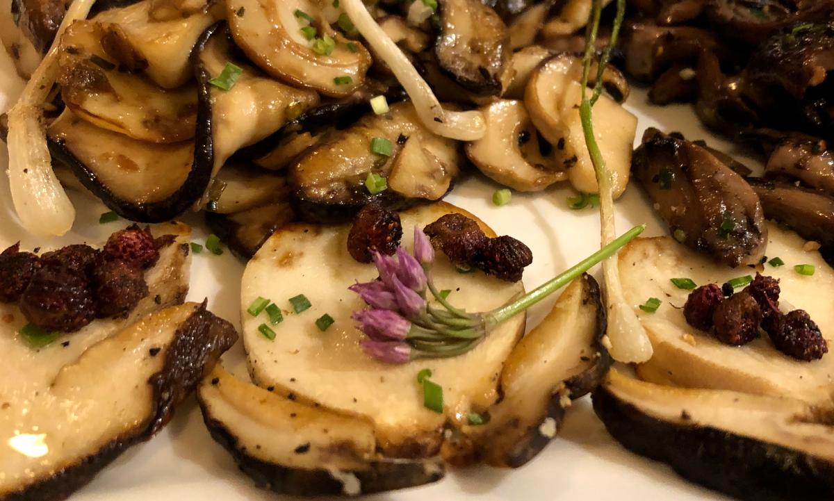 The day's foraged goods are sauteed in olive oil by the chef at The West End Bistro at The Hotel Telluride. (Courtesy of Emily Bond)