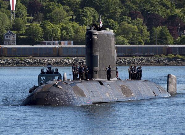 HMCS Windsor, one of Canada's Victoria-class long-range patrol submarines, returns to port in Halifax on June 20, 2018. (The Canadian Press/Andrew Vaughan