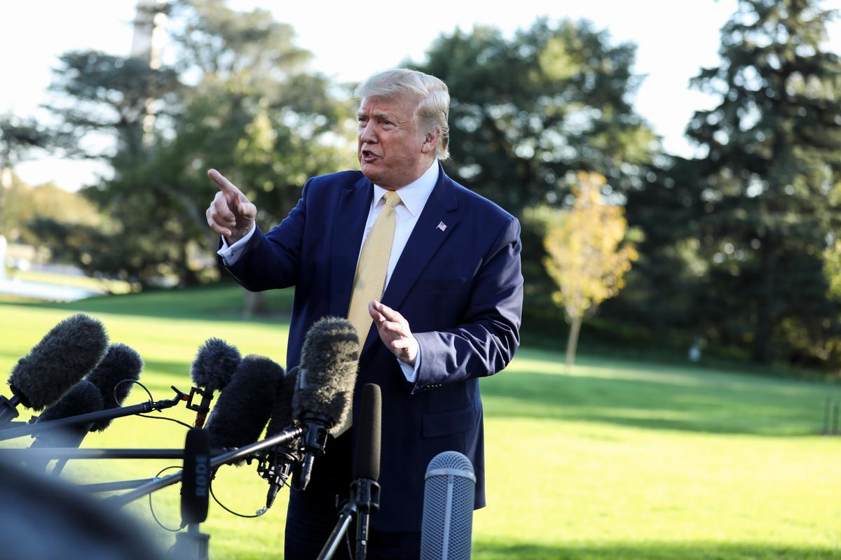 President Donald Trump speaks to media before departing the White House on Marine One on Oct. 11, 2019. (Charlotte Cuthbertson/The Epoch Times)