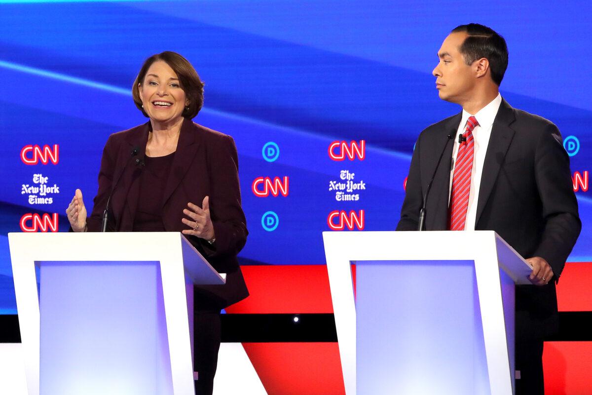 Sen. Amy Klobuchar (D-Minn.) speaks as former housing secretary Julian Castro looks on during the Democratic Presidential Debate at Otterbein University in Westerville, Ohio on Oct. 15, 2019. (Photo by Win McNamee/Getty Images)
