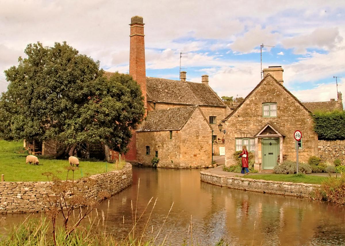 With pretty stone cottages, beautiful flower gardens, slow-flowing streams, and the Old Mill (L), Lower Slaughter is the definition of quaint. (Fred J. Eckert)