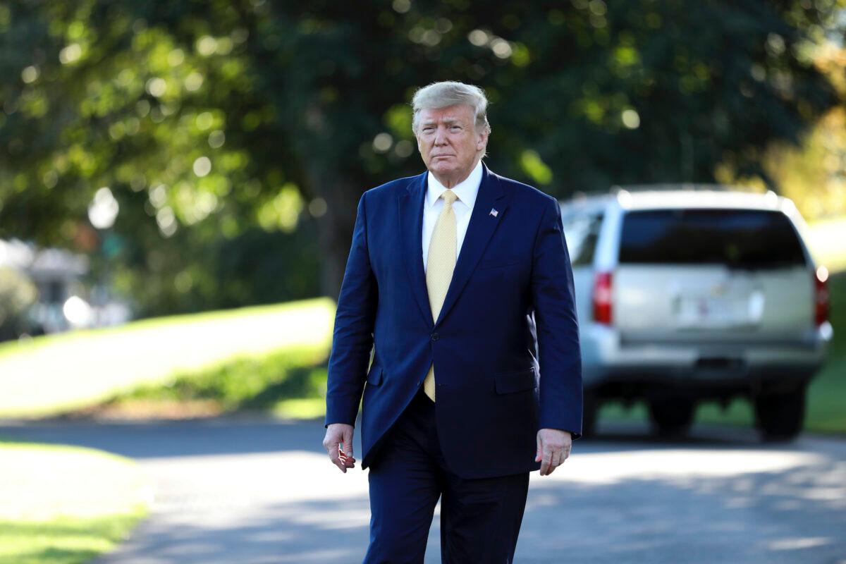 President Donald Trump heading to speak to media before departing the White House on Marine One on Oct. 11, 2019. (Charlotte Cuthbertson/The Epoch Times)