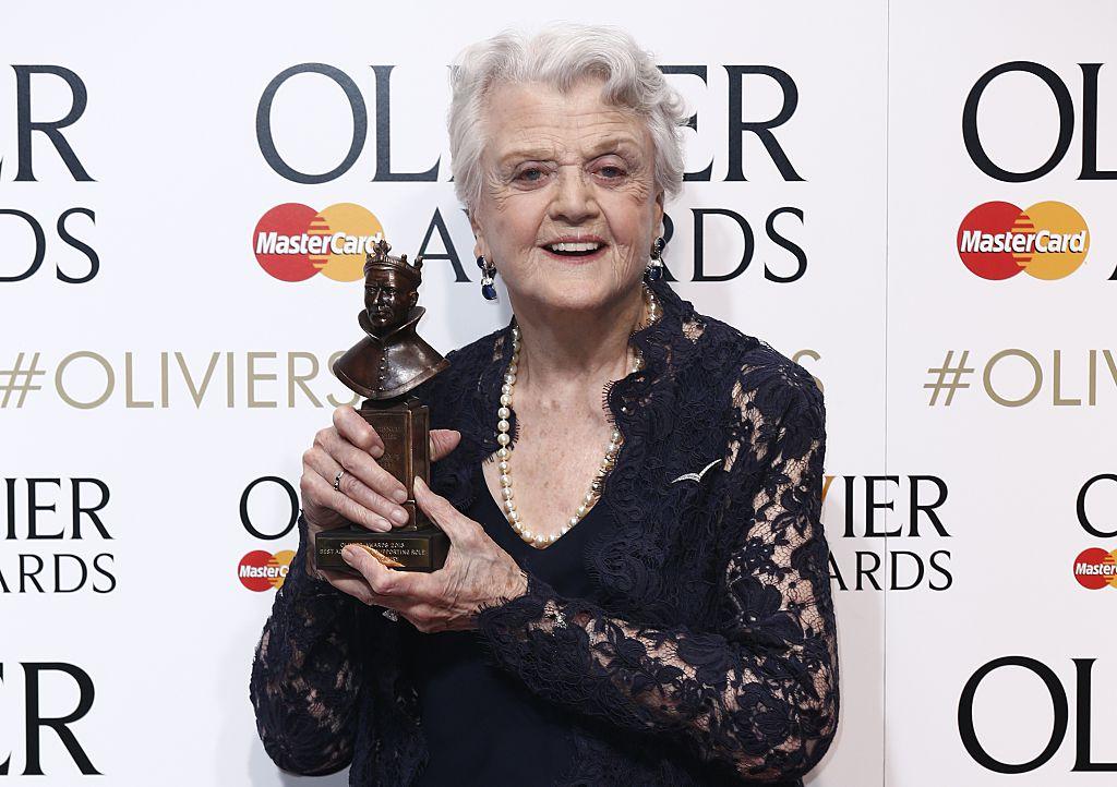 Lansbury poses with the award for best actress in a supporting role for her work in the play Blithe Spirit in London on April 12, 2015. (©Getty Images | <a href="https://www.gettyimages.com.au/detail/news-photo/british-american-actress-angela-lansbury-poses-with-the-news-photo/469486570">JUSTIN TALLIS/AFP</a>)