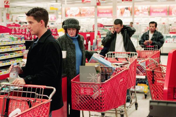 Shoppers line up to pay for their merchandise at a checkout counter in a Target store in Chicago, Ill., on Nov. 30, 2004. (Scott Olson/Getty Images)