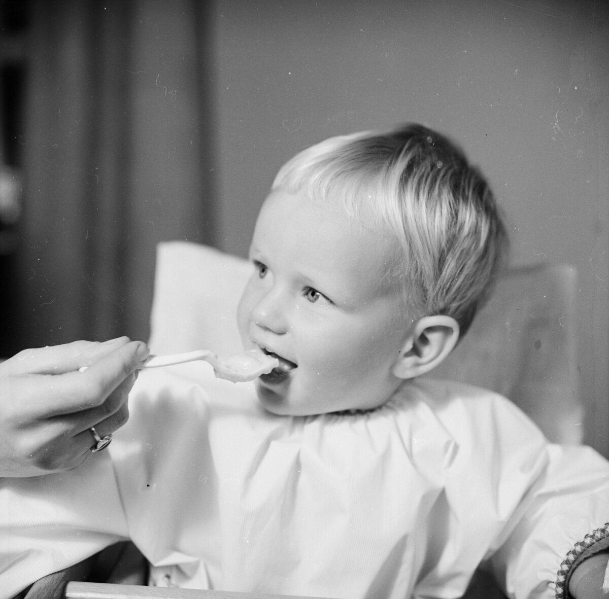 A baby is given a spoonful of food in a file photograph. (Chaloner Woods/Getty Images)
