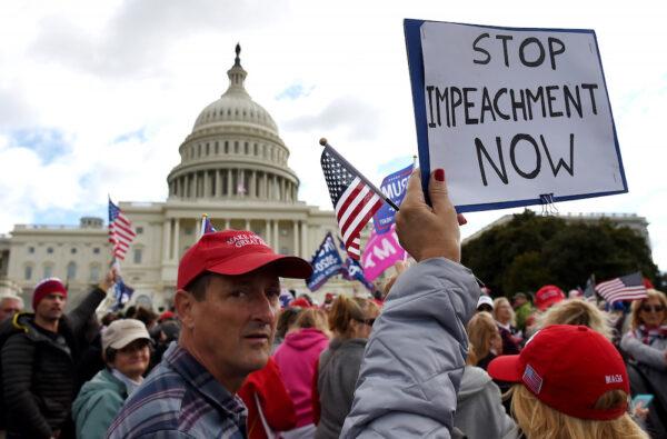Supporters of President Donald Trump hold a "Stop Impeachment" rally in front of the Capitol in Washington on Oct. 17, 2019. (Olivier Douliery/AFP via Getty Images)