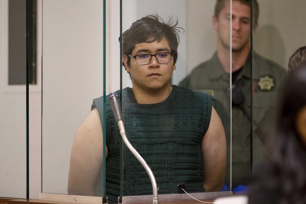 Angel Granados-Diaz, 19, a Parkrose High School student accused of bringing shotgun to class, appears in a brief court hearing in Portland, Ore., on May 20, 2019. (Dave Killen/The Oregonian via AP, Pool)