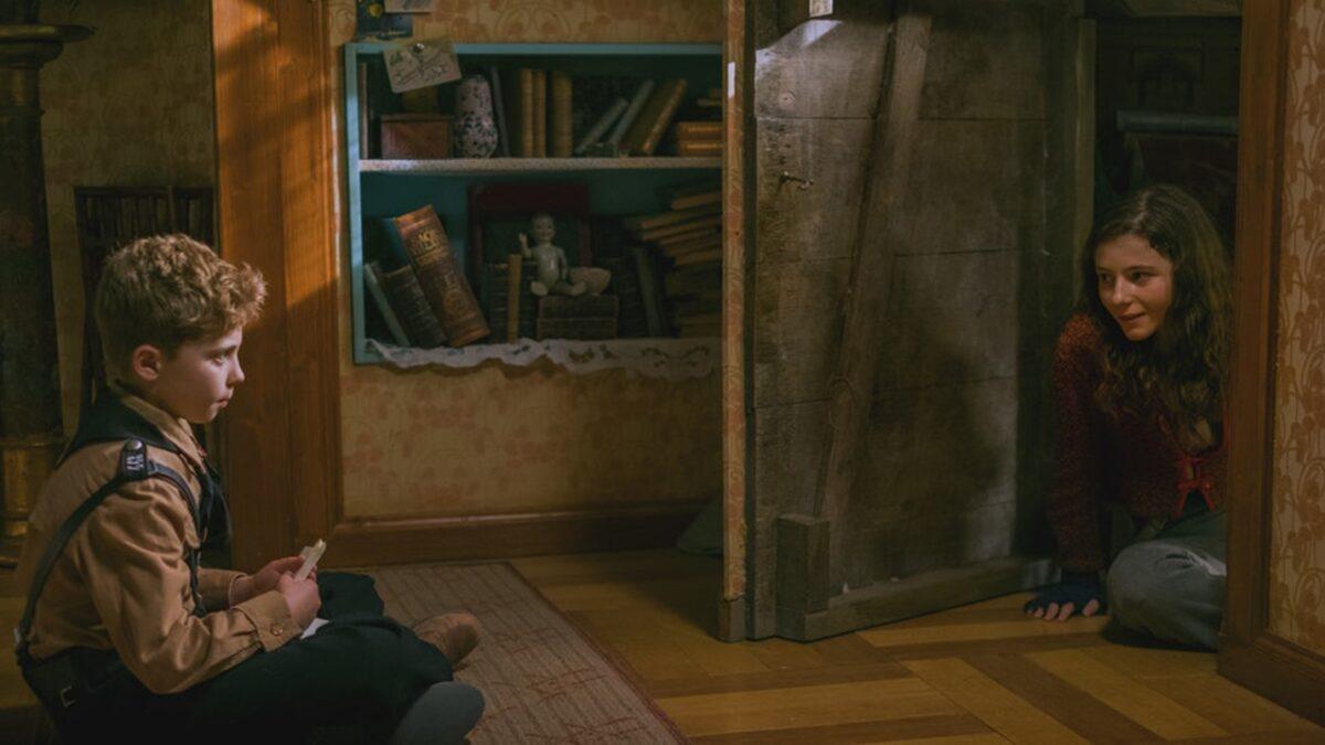 Jojo (Roman Griffin Davis) slowly befriends a young Jewish girl (Thomasin McKenzie) hiding in his house, in “Jojo Rabbit.” (Fox Searchlight)