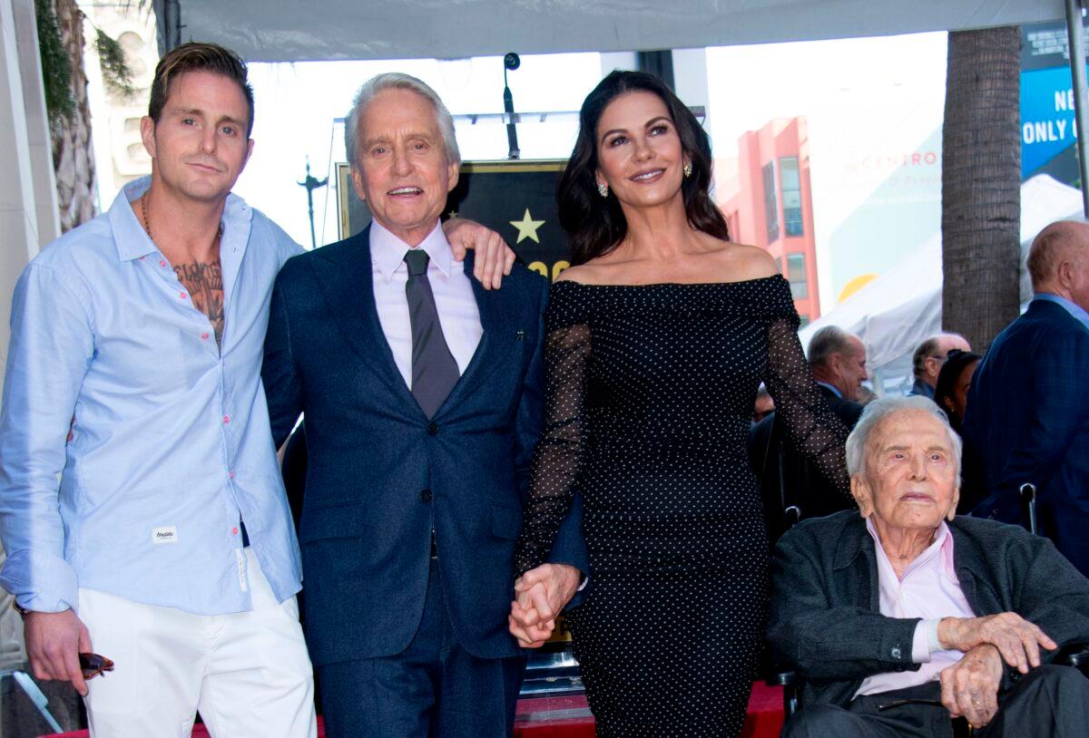 Cameron Douglas, Michael Douglas, Catherine Zeta-Jones and Kirk Douglas attend the ceremony honoring actor Michael Douglas with a Star on Hollywood Walk of Fame, in Hollywood, California on Nov. 6, 2018. (Valerie Macon/AFP)