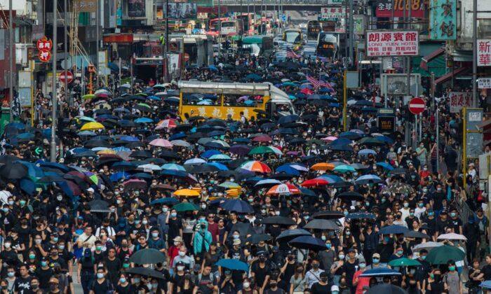 350,000 Hongkongers March Despite Police Ban, Days After Assault on Prominent Activist