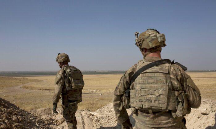 All US Troops Withdrawing From Syria Are Going to Western Iraq, Says Esper