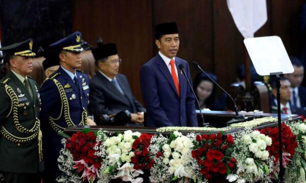 Indonesian President Joko Widodo delivers a speech after taking his oath during his presidential inauguration for the second term, at the House of Representatives building in Jakarta, Indonesia on Oct. 20, 2019. (Adi Weda/Pool via Reuters)