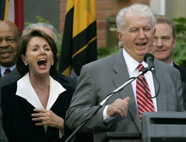 Speaker of the House Nancy Pelosi (D-Calif.) (L) laughs as her brother Thomas D' Alesandro III (R) makes a joke as he introduces her husband Paul, during a street renaming ceremony on her behalf, in Baltimore, Md., on Jan. 5, 2007. (Chris Gardner/AP Photo)