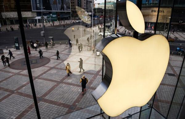 The Apple logo is seen on the window at an Apple Store in Beijing, China, on Jan. 7, 2019. (Kevin Frayer/Getty Images)