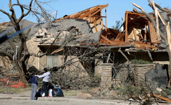 A house damaged by a tornado sits with a destroyed roof in the Preston Hollow section of Dallas on Oct. 21, 2019. (LM Otero/AP Photo)