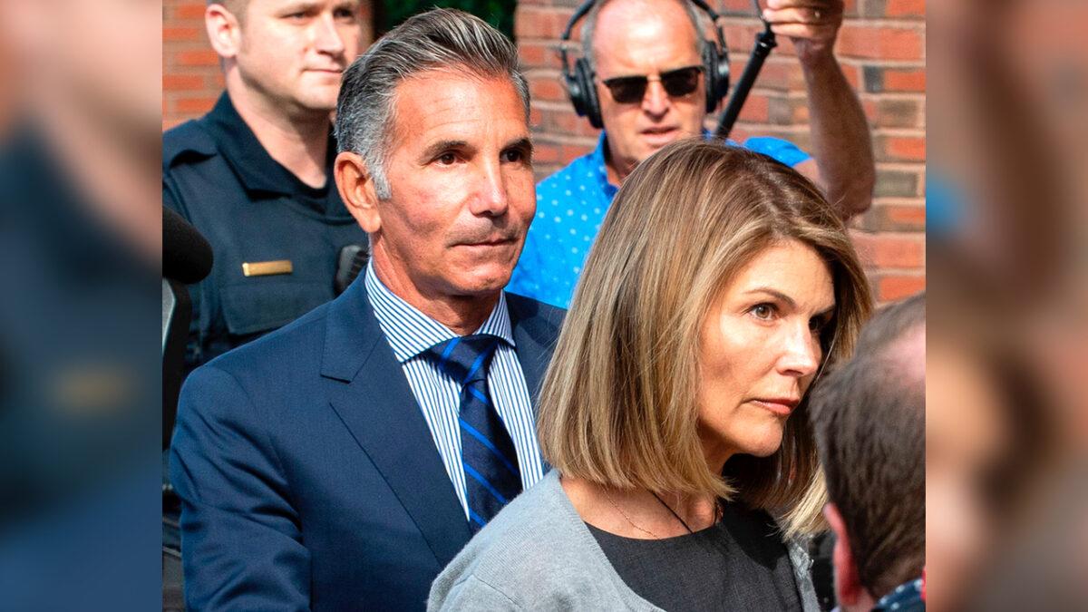 Actress Lori Loughlin and husband Mossimo Giannulli exit the Boston Federal Court house after a pre-trial hearing with Magistrate Judge Kelley at the John Joseph Moakley U.S. Courthouse in Boston, Mass., on Aug. 27, 2019. (Joseph Prezioso/AFP/Getty Images)