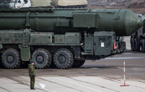 A Russian soldier stands in front of an RS-24 Yars mobile intercontinental ballistic missile system at the Alabino training ground on April 5, 2017. (Sergei Bobylev/Russian Defense Ministry Press Office)