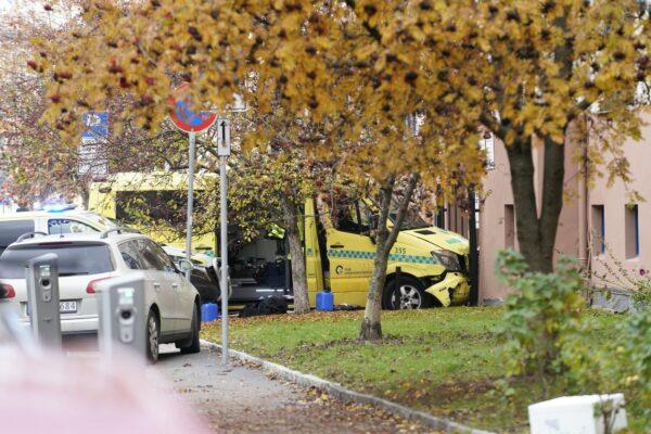 A damaged ambulance is seen crashed into a building after an incident in the center of Oslo on Oct. 22, 2019. (Stian Lysberg Solum/NTB scanpix via AP)