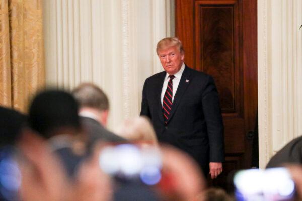 President Donald Trump enters the East Room of the White House in Washington on Oct. 16, 2019. (Charlotte Cuthbertson/The Epoch Times)