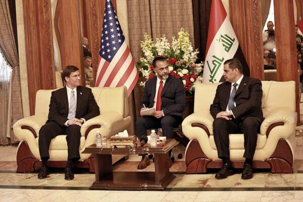 Iraqi Defense Minister Najah al-Shammari (R) meets with visiting U.S. Defense Secretary Mark Esper (L) at the Ministry of Defense in Baghdad, Iraq, on Oct. 23, 2019. (Hadi Mizban/AP Photo)