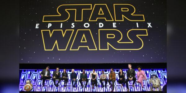 Stephen Colbert, from left, J.J. Abrams, Kathleen Kennedy, Anthony Daniels, Billy Dee Williams, Daisy Ridley, John Boyega, Oscar Isaac, Kelly Marie Tran, Joonas Suotamo and Naomi Ackie participate in the "Star Wars: The Rise of Skywalker" panel on day 1 of the Star Wars Celebration at Wintrust Arena in Chicago on April 12, 2019. (Rob Grabowski/Invision/AP)