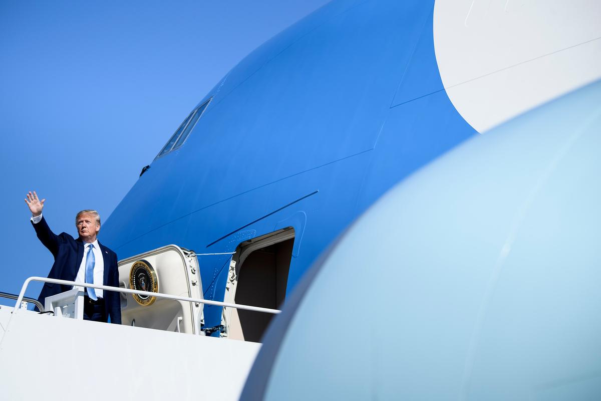 President Donald Trump boards Air Force One at Joint Base Andrews in Maryland as he travels to Pittsburgh, Pennsylvania on Oct. 23, 2019. (Photo by Brendan Smialowski/AFP via Getty Images)