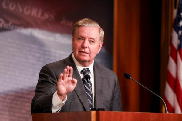 Sen. Lindsey Graham (R-S.C.) holds a press conference about the House impeachment inquiry process, on Capitol Hill in Washington on Oct. 24, 2019. (Charlotte Cuthbertson/The Epoch Times)