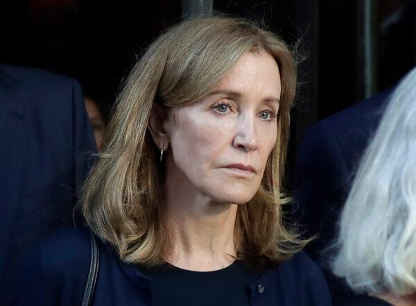 Actress Felicity Huffman leaves federal court after her sentencing in a nationwide college admissions bribery scandal in Boston, on Sept. 13, 2019. (Elise Amendola/AP Photo)