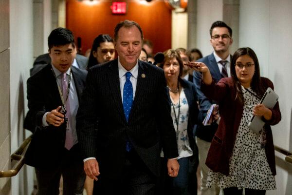 House Intelligence Committee Chairman Rep. Adam Schiff (D-Calif.) leaves a secure area where Deputy Assistant Secretary of Defense Laura Cooper is testifying as part of the House impeachment inquiry into President Donald Trump on Capitol Hill in Washington on Oct. 23, 2019. (Patrick Semansky/AP Photo)