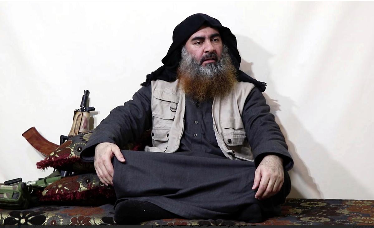 A file image made from a video posted on a militant website on April 29, 2019, purports to show the leader of ISIS, Abu Bakr al-Baghdadi, being interviewed by his group's Al-Furqan media outlet. (Al-Furqan media via AP, File)