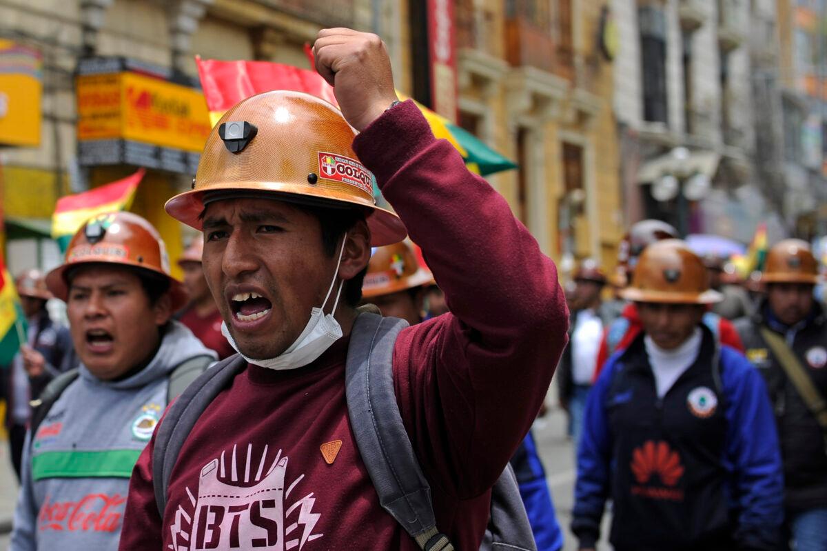 Miners march to support the Movimiento Al Socialismo (MAS) party and its leader Bolivian President Evo Morales in La Paz on Oct. 28, 2019. (JORGE BERNAL/AFP via Getty Images)