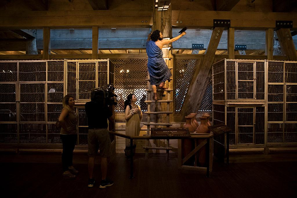 Members of the media film the dioramas in the interior of the Ark Encounter replica in 2016. (©Getty Images | <a href="https://www.gettyimages.com.au/detail/news-photo/members-of-the-media-film-the-interior-of-the-ark-encounter-news-photo/545141708">Aaron P. Bernstein</a>)
