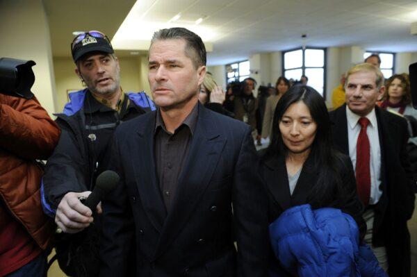 Richard Heene and Mayumi Heene walk out of Courtroom 3A after their sentencing hearing at the Larimer County Justice Center in Fort Collins, Colorado on Dec. 23, 2009. (Chris Schneider/Getty Images)