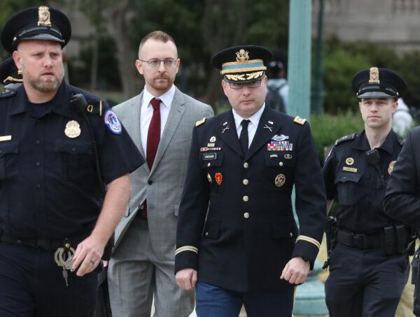 Lt. Col. Alexander Vindman, center, director for European Affairs at the National Security Council, arrives at the U.S. Capitol in Washington on Oct. 29, 2019. (Mark Wilson/Getty Images)