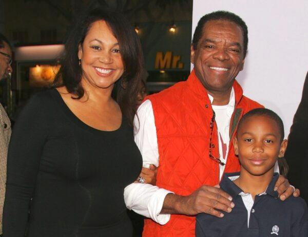 Actress Angela Robinson and actor John Witherspoon with their son at the Mann Village Theatre and Mann Bruin Theatre in Westwood, California, on Dec. 7, 2006. (Frazer Harrison/Getty Images)