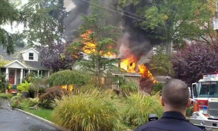 Small Plane Crashes, Leaving Pilot Dead, Houses Ablaze