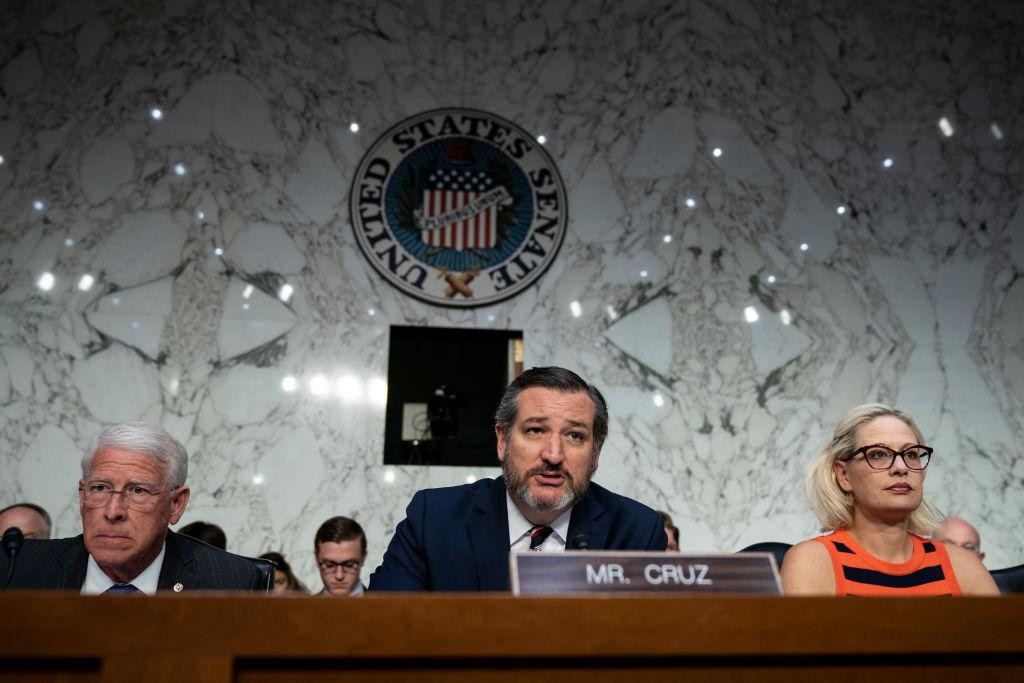 (L-R) Commerce Committee chairman Sen. Roger Wicker (R-Miss.), subcommittee chairman Sen. Ted Cruz (R-Texas), and subcommittee ranking member Sen. Krysten Sinema (D-Ariz.) attend a Senate Commerce Subcommittee on Aviation and Space hearing about the current state of airline safety in the Hart Senate Office Building, March 27, 2019, in Washington. (Drew Angerer/Getty Images)