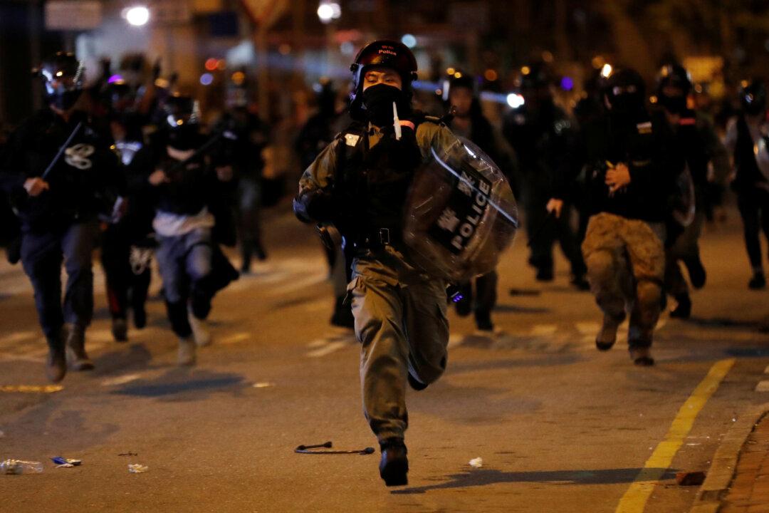 Hong Kong Police Fire Tear Gas to Disperse Protesters at Halloween Festivities