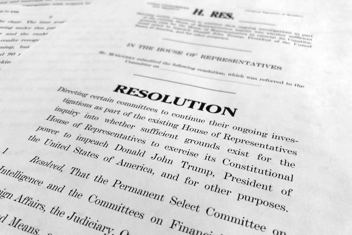 The text of a House resolution released by the Democrats that authorizes the next phase of the impeachment inquiry against President Donald Trump is photographed in Washington on Oct. 29, 2019. (AP Photo/Jon Elswick)