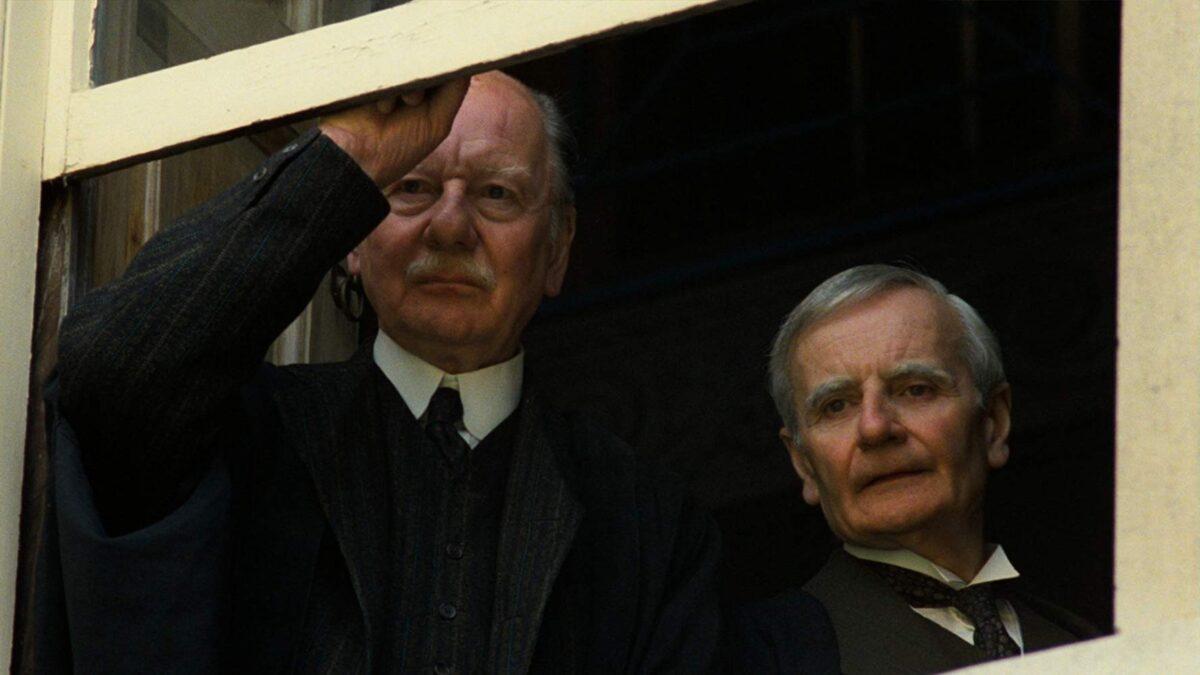 Sir John Gielgud (L) and Lindsay Anderson as Cambridge University dons in "Chariots of Fire." (20th Century Fox)