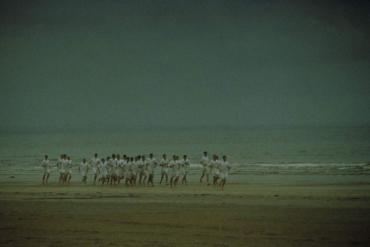 The Cambridge University track team training on the beach in "Chariots of Fire." (20th Century Fox)