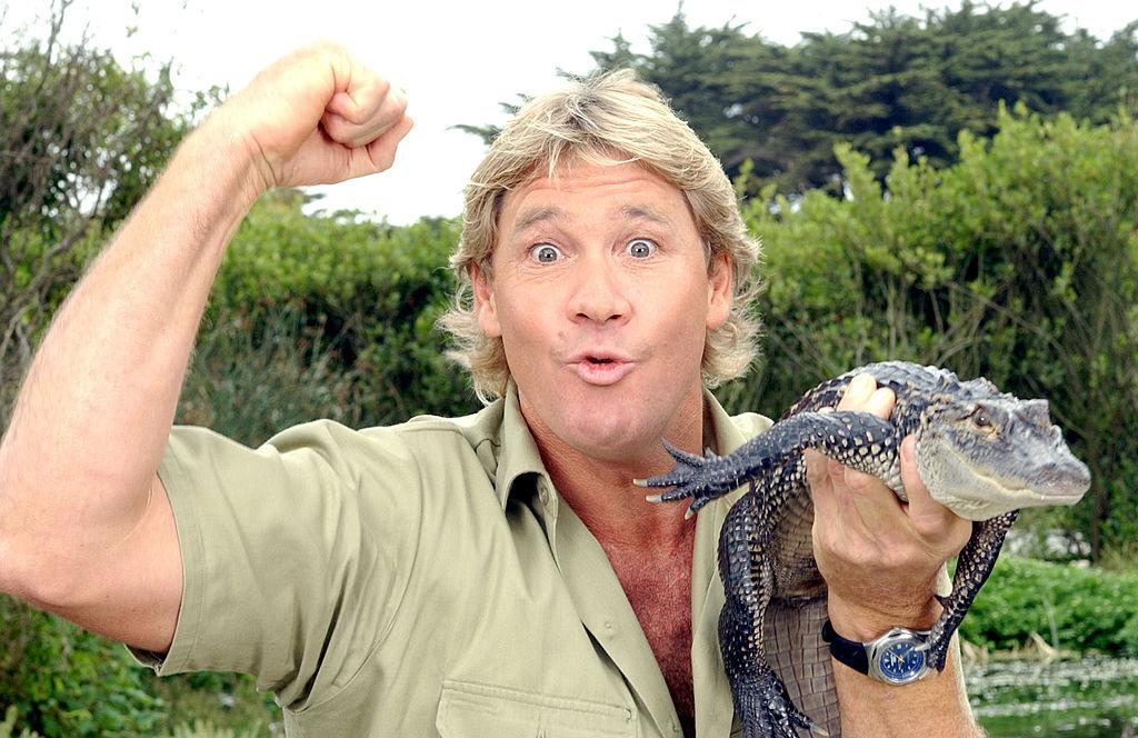 "Crocodile Hunter" Steve Irwin poses with a 3-foot-long alligator at the San Francisco Zoo in California on June 26, 2002. (©Getty Images | <a href="https://www.gettyimages.com/detail/news-photo/the-crocodile-hunter-steve-irwin-poses-with-a-three-foot-news-photo/1129399?adppopup=true">Justin Sullivan</a>)