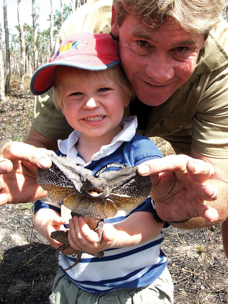 Irwin poses with his son, Robert, at Australia Zoo in Beerwah, Australia on Aug. 2, 2006 (©Getty Images | <a href="https://www.gettyimages.com/detail/news-photo/steve-irwin-poses-with-his-son-bob-at-australia-zoo-august-news-photo/77794221?adppopup=true">Australia Zoo</a>)