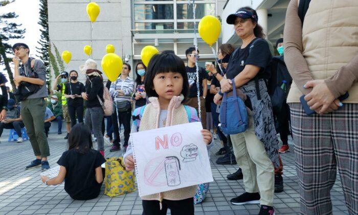 Parents, Children Standing Side-by-Side Demand HK Police Stop Using Tear Gas