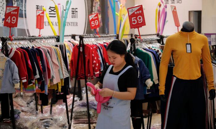 China’s Economy Struggles as Consumers Tighten Belts