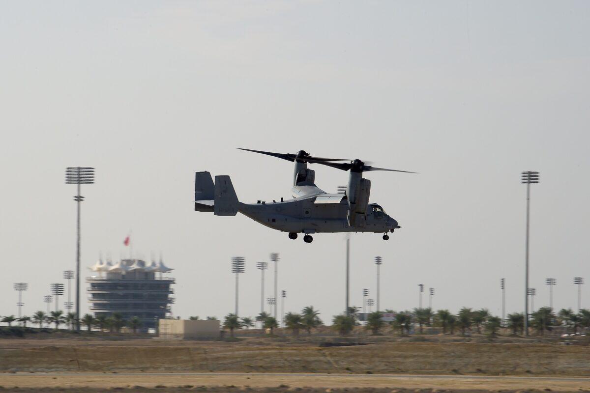 A US Marine Corps (USMC) Bell Boeing V-22 Osprey tiltrotor military aircraft performs air maneuvers during the 2018 Bahrain International Airshow at the Sakhir Airbase, (STR/AFP via Getty Images)