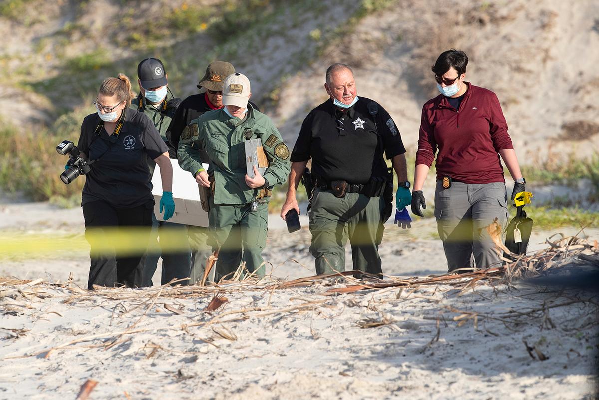 Investigators say two bodies found buried at the south Texas beach have been identified as a missing New Hampshire couple. (Courtney Sacco/Corpus Christi Caller-Times via AP, File)