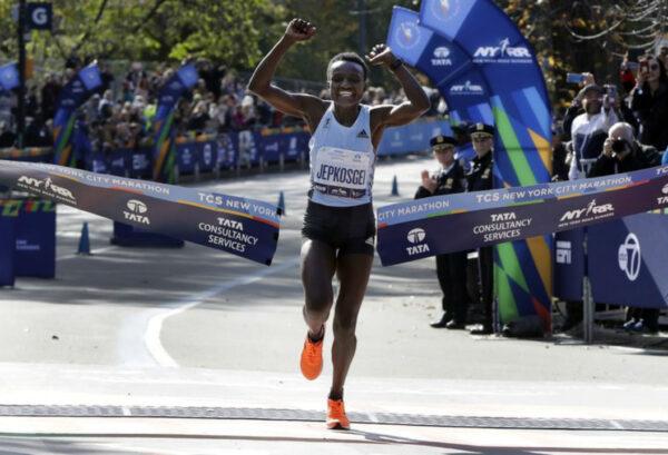 Joyciline Jepkosgei, of Kenya, crosses the finish line to win the Pro Women’s Division of the New York City Marathon, in New York’s Central Park on Nov. 3, 2019. (Richard Drew/AP Photo)
