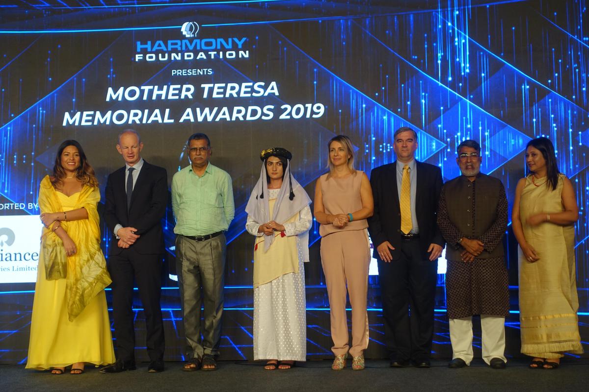 Dr. Torsten Trey (third from the right) represented DAFOH at the Mother Teresa Memorial Awards for Social Justice. (Courtesy of Mark Luburic)