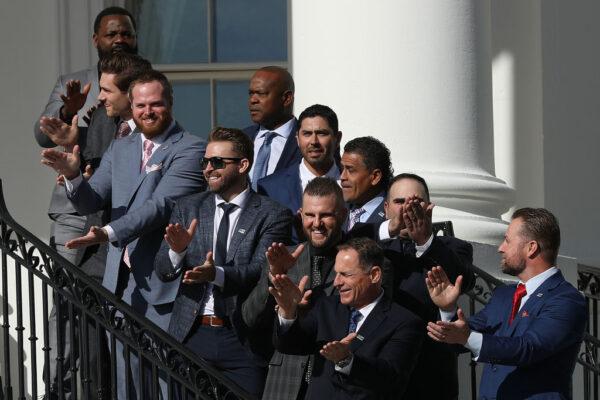 2019 World Series Champions Washington Nationals players (front row L-R) Fernando Rodney, Trea Turner, Aaron Burnett, Brian Dozier, Matt Adams, and other teammates do the 'Baby Shark' dance during a celebration of their victory on the Truman Balcony at the White House on Nov. 4, 2019. (Chip Somodevilla/Getty Images)